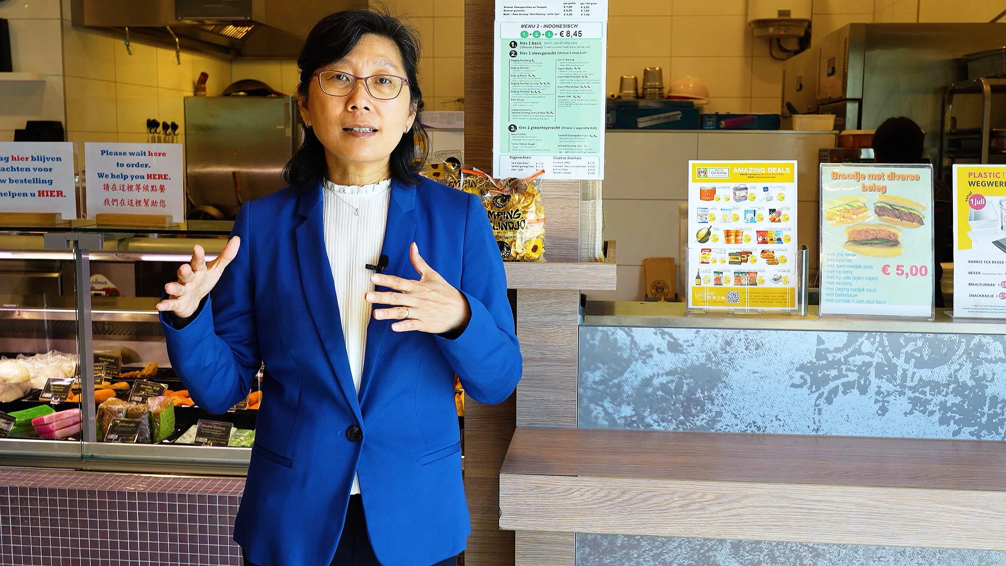 An Amazing Oriental representative speaking on camera in one of their stores