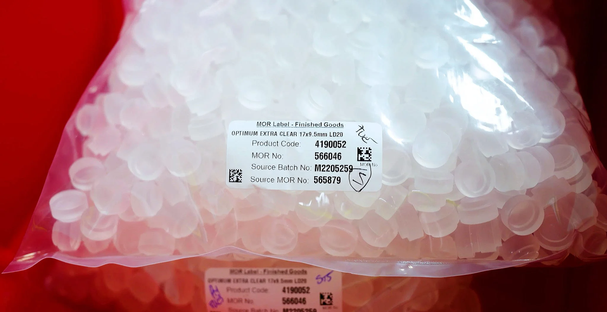 A bag of finished Contamac product with its CompuTec Labels batch label