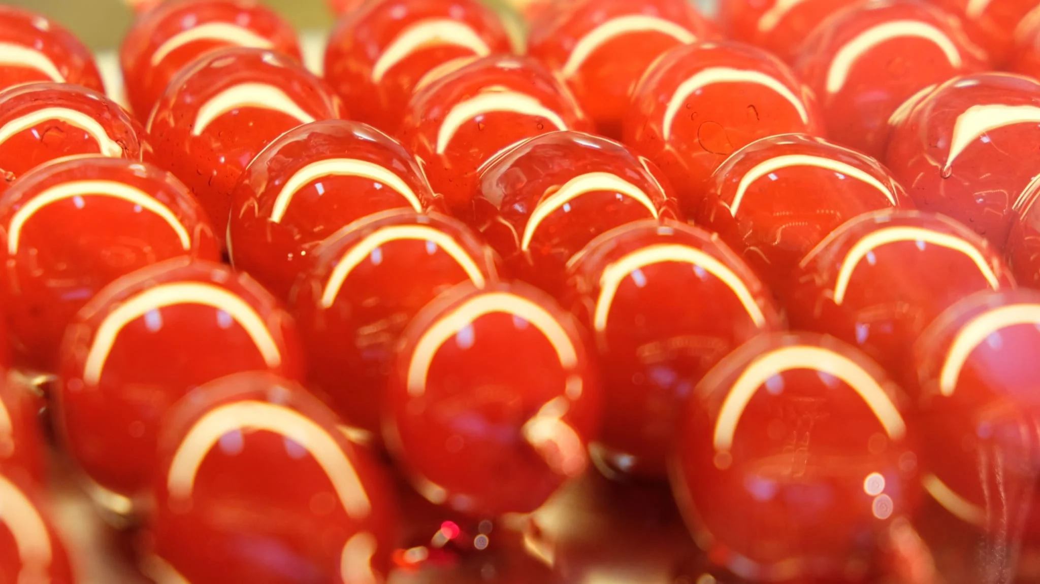 Glacé cherries piled together
