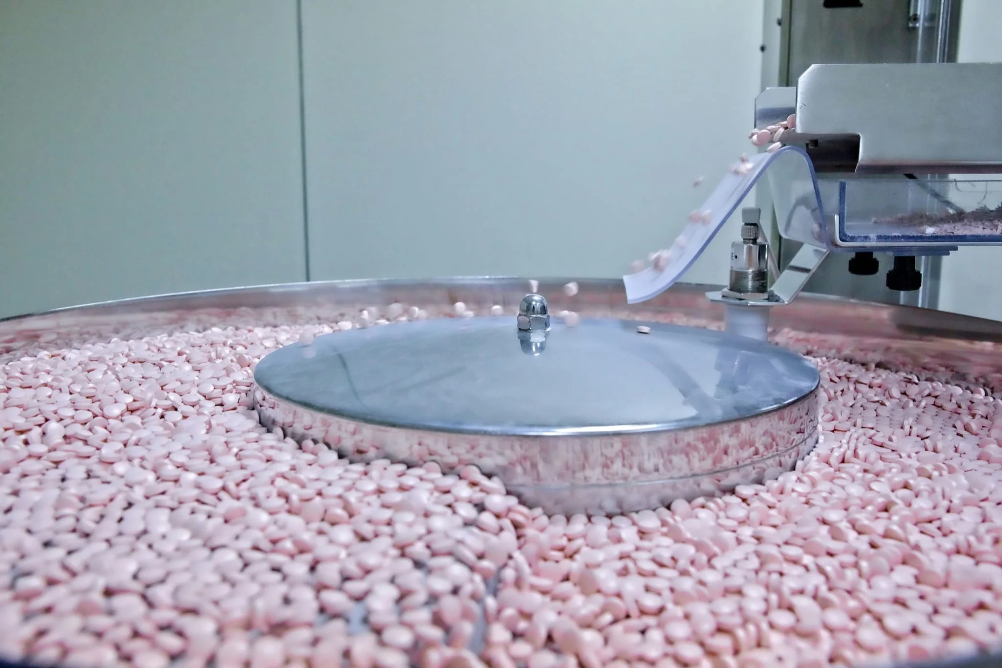 A rotary drum coating a batch of confectionery