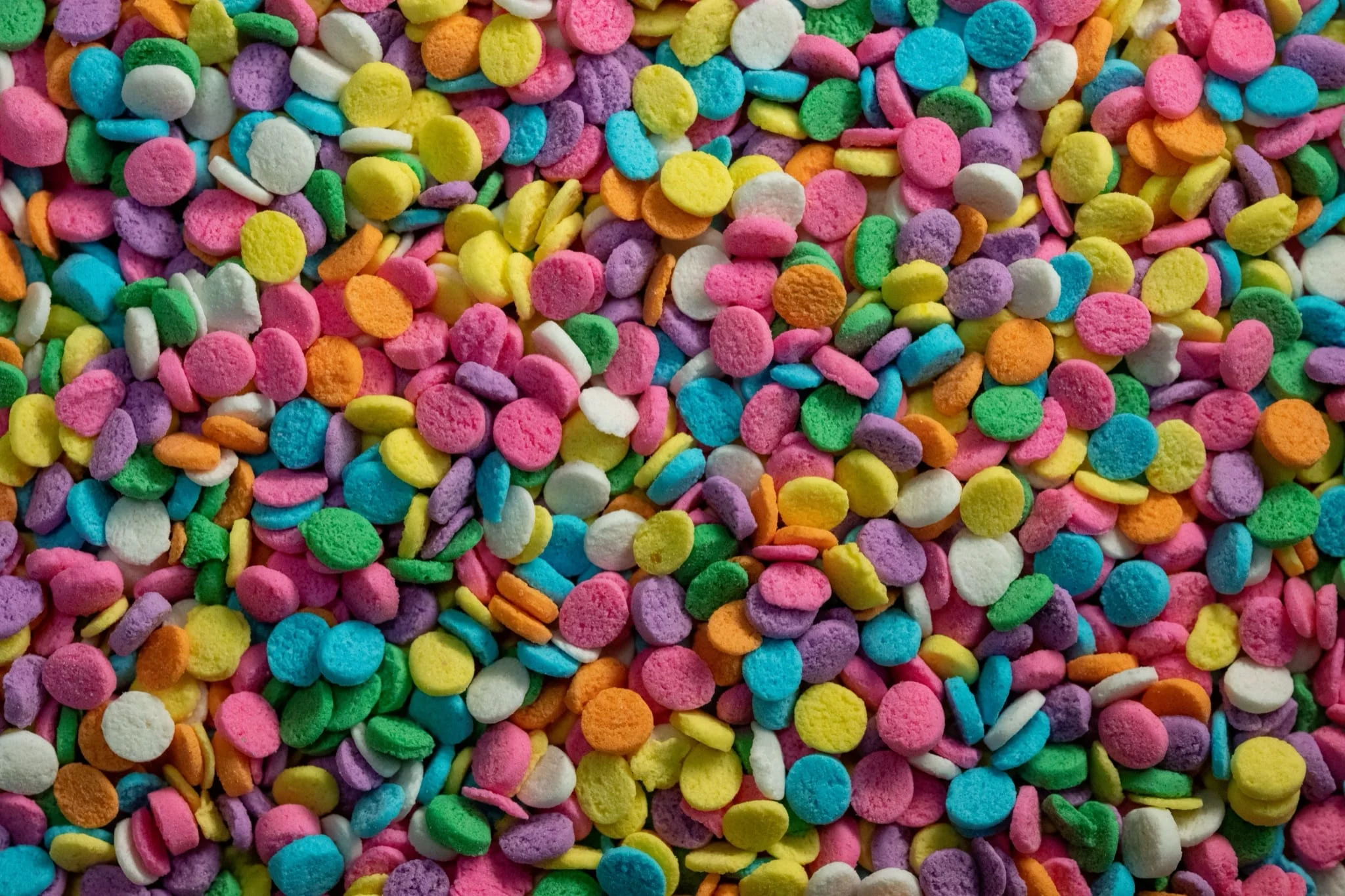 A close-up of colorful confectionery sprinkles